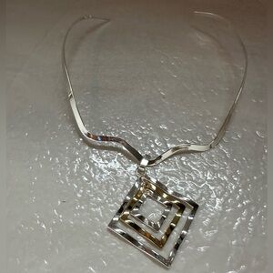 Elegant Silver and Gold Geometric Necklace